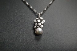 Modern silver necklace with pearls. With certification.