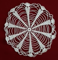 Round lace tablecloth with spider web pattern