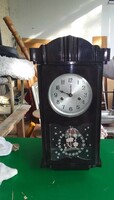 Retro black lacquered polar wall clock.