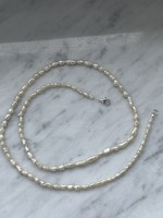 Beautiful baroque true pearl with silver clasp.