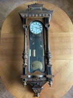 Pewter wall clock with a quarter strike mechanism