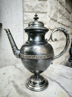 Antique ornate silver-like pouring coffee pot with master’s mark