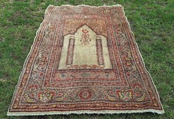 Old hand-knotted carpet 204 x 124 cm.