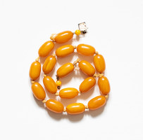 Egg yellow colored amber/vinyl beads - necklace material