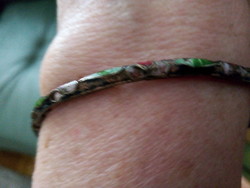 Copper bracelet with fire enamel decoration