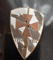 A damaged, incomplete badge of a front fighter association