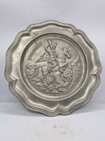 Pewter wall plate depicting the dragon-slaying holy pearl