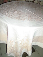 Beautiful peach-pink damask tablecloth with baroque leaf pattern
