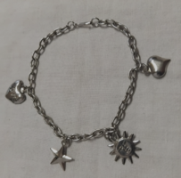 Silver-colored bracelet with pendants made with elaborate work