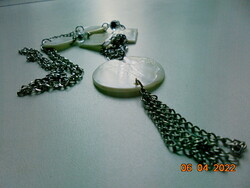 2 larger hearts, 2 larger rectangles and 1 large round pendant made of shell polished with a chain