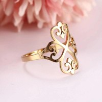 Ring with a four-leaf clover motif made of mirror-bright medical steel