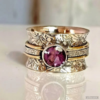 Elegant purple zircon stone ancient pattern gold ring for women made of medical steel.