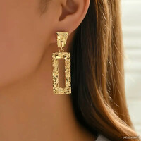 Showy women's earrings with a geometric design are stable, the needle is made of medical steel.