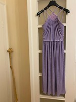 Nagyon szép,halvány lila alkalmi ruha. 40-es méret. Alig használt. Made in England.Hossza:122cm