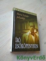 Fried István: Író esőköpenyben