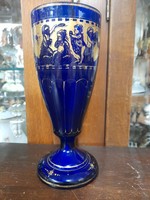 Alt Wien, Viennese Biedermeier ca. 1910 Blue glass goblet with gilded putty decor. 21 Cm.
