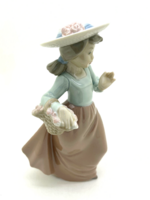 Lladro Nao Girl with Hat Walking with Flower Bouquet 17.5cm