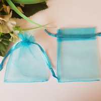 ÚJ, türkizkék organza dísztasak, ajándék tasak – kb. 7x9cm