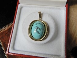 8 karátos arany medál howlit vagy magnezit ásvánnyal