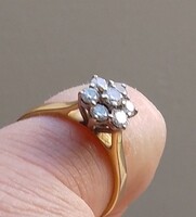 Eljegyzési  gyűrű,18 karátos arany,  7 db gyémántokkal , mérete: 62  19,8 mm