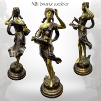 Női bronz szobor talapzaton