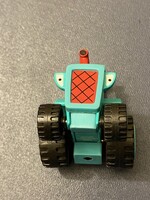 Traktor,gyerekjáték,halványzöld színben.Mérete: 5x3,5 cm Teljesen új állapotban.