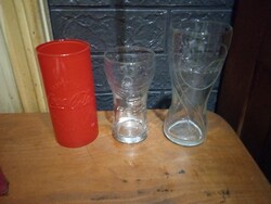 3 drinking glasses 2 Coke a Cola and 1 Pepsi