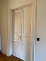 Dupla szárnyú ajtók réz kilinccsel