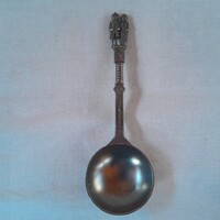 Decorative pewter spoon.