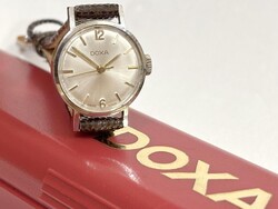 1966-os ezüst számlapos női doxa, pontos működéssel, új bőrszíjjal! Álomszép!  Figyelem: a doxa dobo
