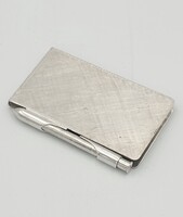 Ezüst, apró méretű jegyzettömb, tollal