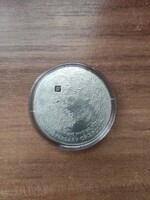 Hold kőzetes ezüst érme eladó