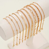 11 DB Karkötőt Arany Tónusú Színben Nemesfém Hipoallergén Ékszer Elegáns Divatos Karkötő Szett Új!