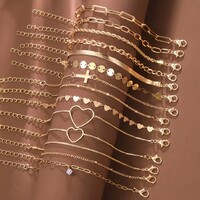 14 DB Karkötőt Arany Tónusú Színben Nemesfém Hipoallergén Ékszer Elegáns Divatos Karkötő Szett Új!