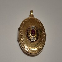 14 K képtartó nyitható arany medál,rubin kő díszítéssel.