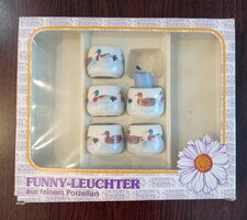 Porcelán gyertyatartók kacsás díszítéssel