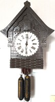 Cuckoo clock in a cottage shape in good condition
