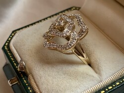 Rengeteg szikrázó  0.41ct gyémánttal 14 kr.arany gyűrű.Igazolással