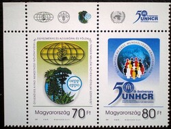 S4600-1cbfs / 2001 Nemzetközi Szervezetek bélyegpár postatiszta bal felső ívsarok
