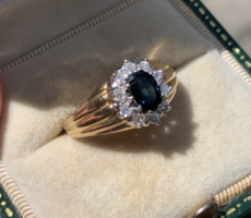 0.50ct gyémántokkal zafírral  arany gyűrű.Igazolással