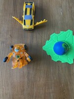 Gyerekjáték. Robot,kisautó,pörgettyű. Új állapotban.
