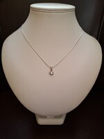 14 kt fehér arany lánc + medál 0,2 ct gyémánttal