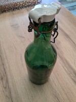 Old vintage green bottle with buckle, 0.5 L.