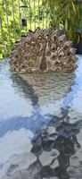 Beautiful silver-plated napkin holder with a peacock pattern