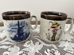 Stackable smaller mugs with Sarah Kay and Delft patterns, set of two