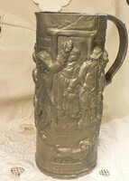 Marked pewter jar with embossed pattern