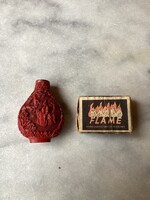 Cinnabar oriental lacquer perfume vial.