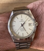 ETERNA KONTIKI KORONAZÁRAS ACÉL KVARCÓRA ROLEX DATEJUST FAZON