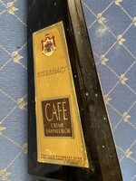 Régi háromszög alakú zöld színű üvegpalack. O,5 liter Esterházy CAFÉ Creme Sahnelikör felirattal.