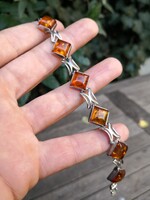 Gyönyörű borostyán köves ezüst karkötő